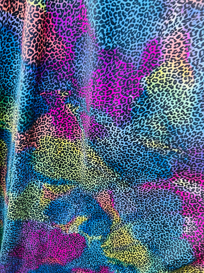 Cheetah design exotic animal print multicolor print on great quality of nylon spandex 4-way stretch 58/60” Sold by the YD. Ships Worldwide