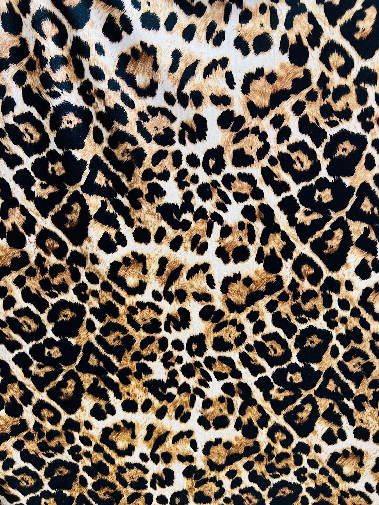 Leopard design Exotic animal print Taupe/Brown print on poly stretch velvet velour 2-way 58/60” Sold by the YD. Ships Worldwide from L.A