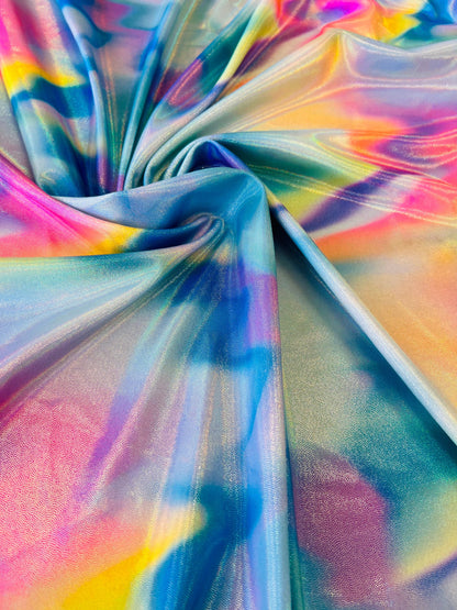 Multi pastel tie dye nylon spandex print on best quality of 4-way metallic spandex 58/60” Sold by the YD.