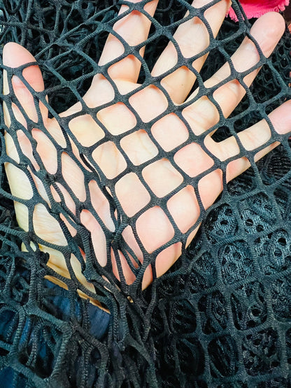 New Fishnet jumbo size black and white  spandex mesh 4-way 58/60” Sold by the YD. Ships worldwide from Los Angeles California USA.