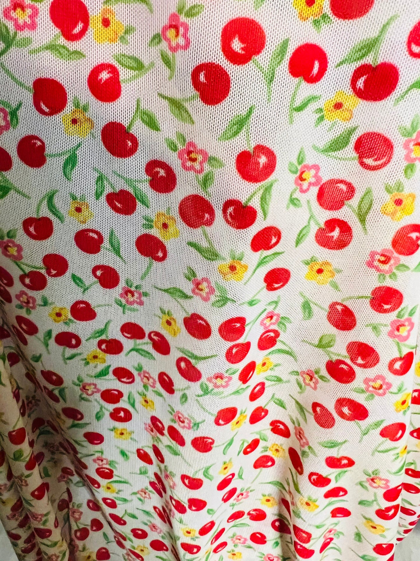 Cherry design print on best quality of power mesh nylon spandex 4-way stretch 58/60” Sold by the YD. Ships Worldwide from Los Angeles CA