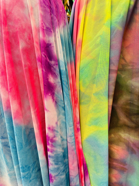 Tie dye design power mesh 4-way stretch 58/60” Sold by the YD. Ships Worldwide from Los Angeles California USA.