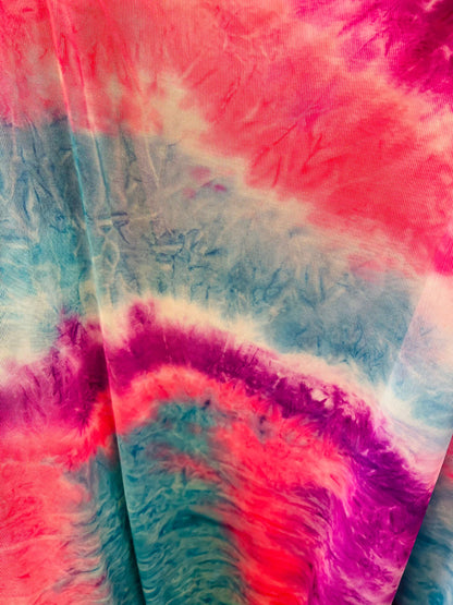 Tie dye design power mesh 4-way stretch 58/60” Sold by the YD. Ships Worldwide from Los Angeles California USA.