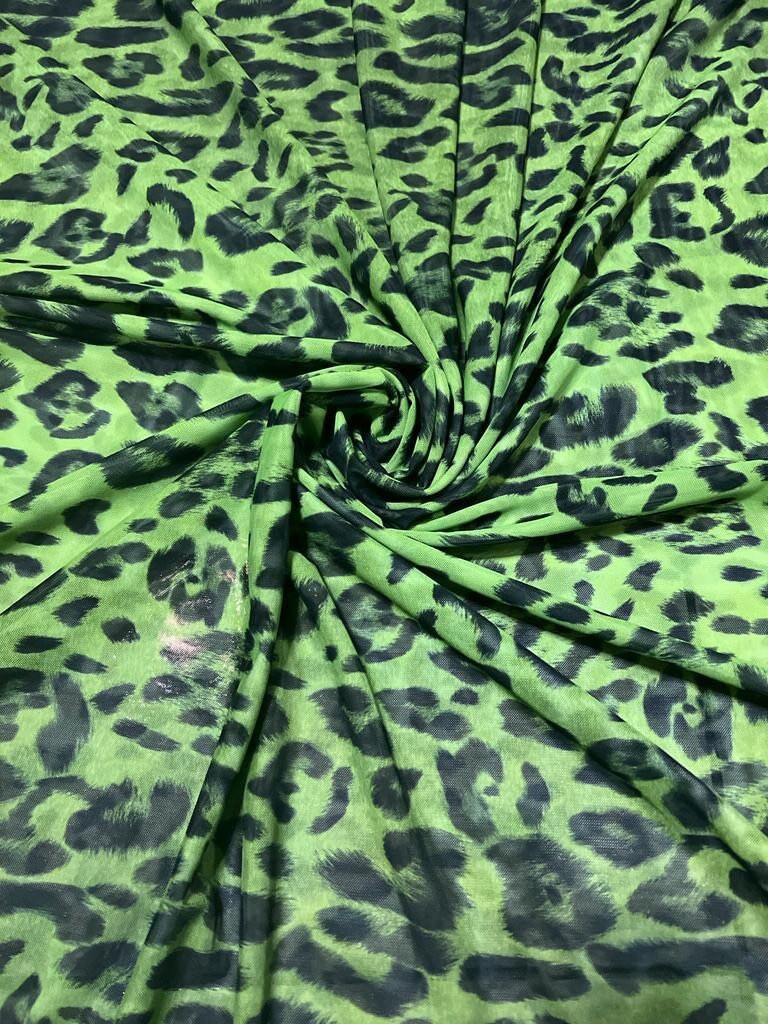 Exotic Leopard design Green/Black print on great quality of power mesh nylon spandex 4-way stretch 58/60” Sold by the YD.