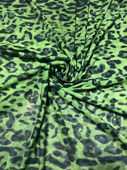 Exotic Leopard design Green/Black print on great quality of power mesh nylon spandex 4-way stretch 58/60” Sold by the YD.