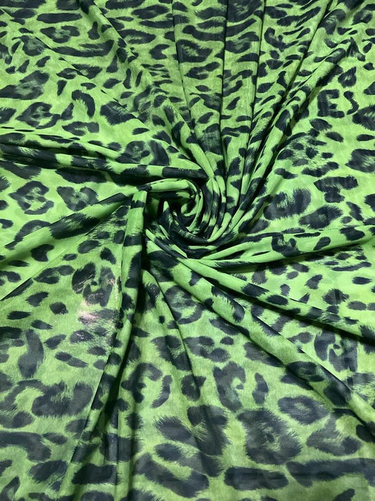 Exotic Leopard design Green/Black print on great quality of power mesh nylon spandex 4-way stretch 58/60” Sold by the YD.