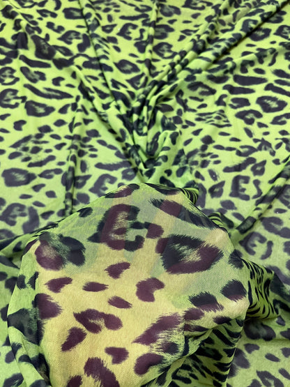 Exotic Leopard design Green/Black print on great quality of power mesh nylon spandex 4-way stretch 58/60” Sold by the YD.