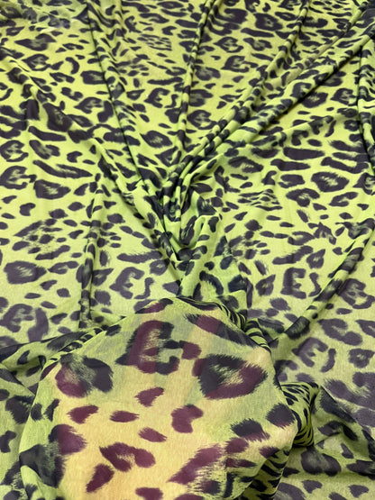 Exotic Leopard design Green/Black print on great quality of power mesh nylon spandex 4-way stretch 58/60” Sold by the YD.