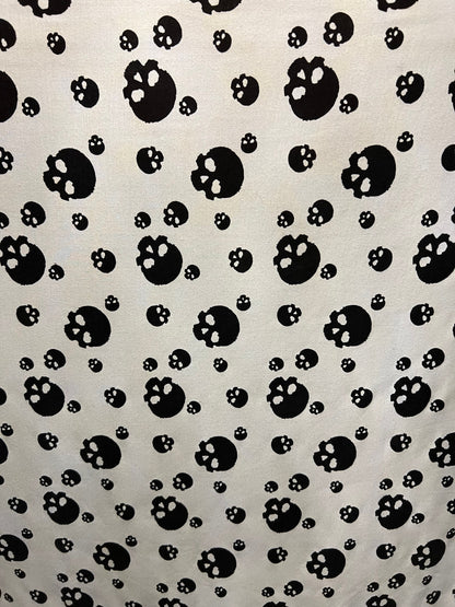 Skulls design print on ponte de Roma cotton knit fabric 2-way stretch 58/60” Sold by the YD. Ships Worldwide from Los Angeles California USA