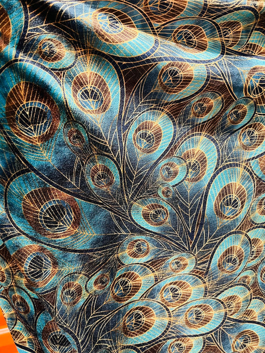 Peacock design New print in stock  Teal blue/Gold print on great quality of stretch velvet4-way stretch 58/60” Sold by the YD.