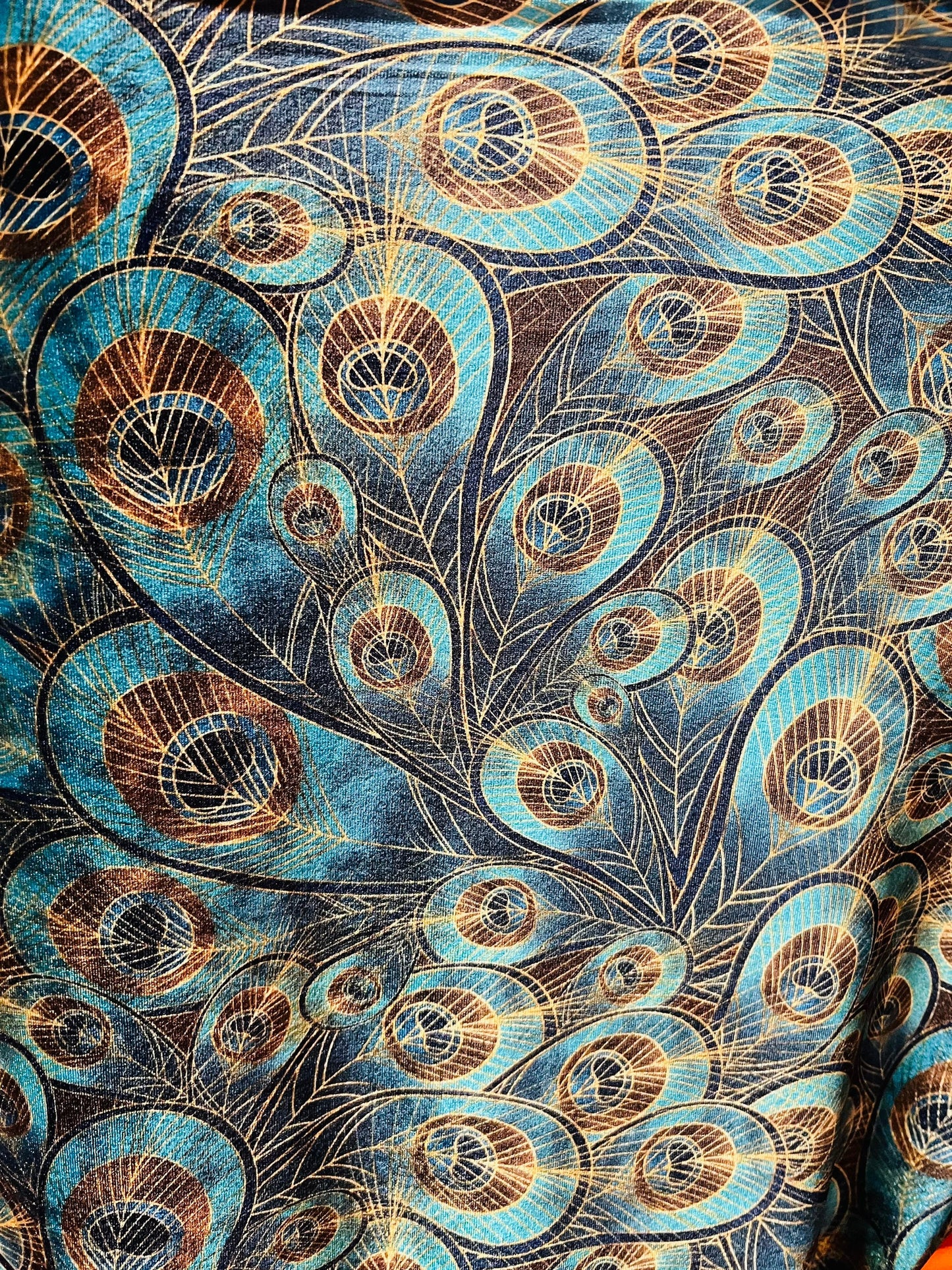 Peacock design New print in stock  Teal blue/Gold print on great quality of stretch velvet4-way stretch 58/60” Sold by the YD.