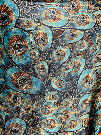 Peacock design New print in stock  Teal blue/Gold print on great quality of stretch velvet4-way stretch 58/60” Sold by the YD.
