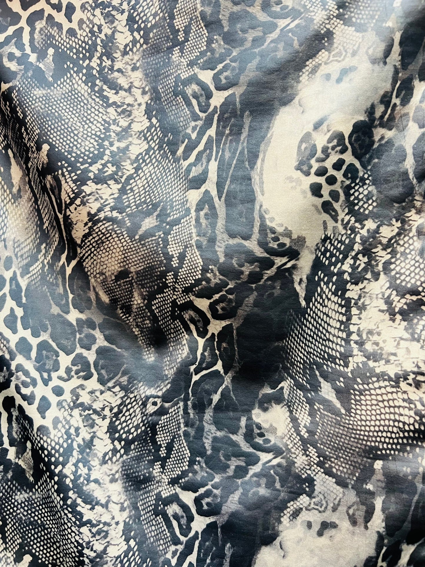 Exotic Multi Animal print on great quality of poly spandex with lame matte foil 2-way stretch 58/60” Sold by the YD.