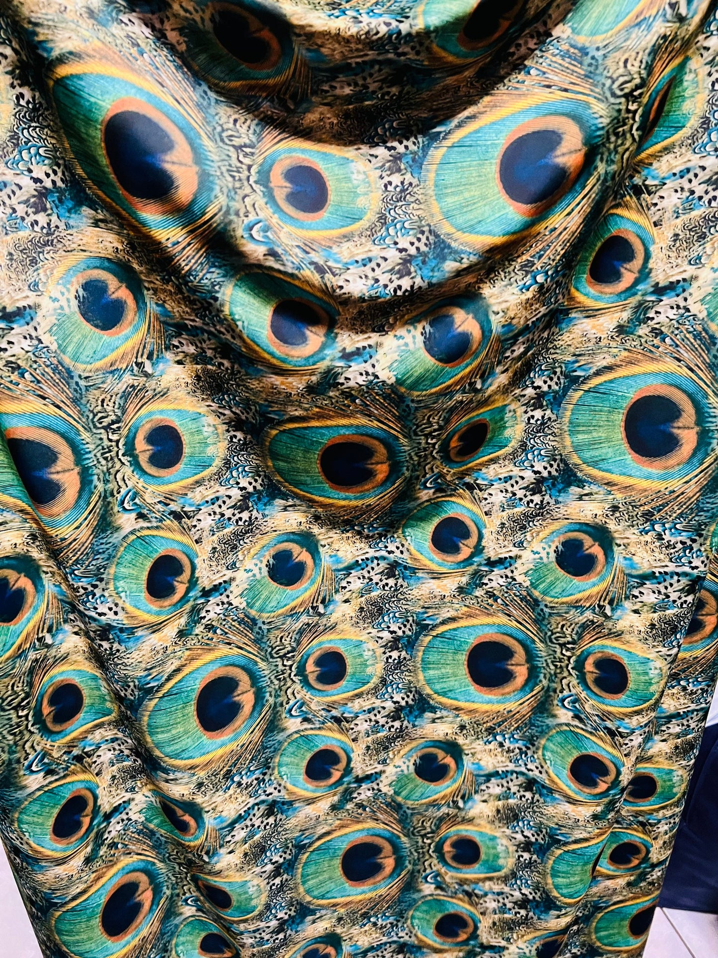 Exotic Peacock design Multicolors in nylon spandex  4way stretch 58/60" Sold by the YD. Ships worldwide from Los Angeles California USA