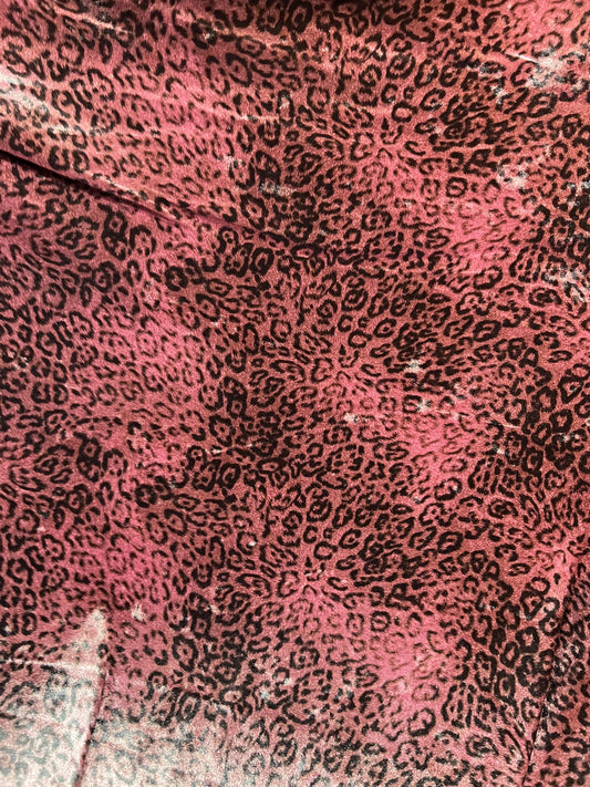 New Exotic Leopard design Mauve/Black print on great quality of stretch velvet 4-way stretch 58/60” Sold by the YD.