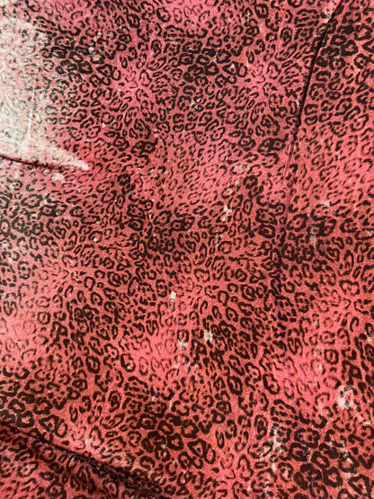 New Exotic Leopard design Mauve/Black print on great quality of stretch velvet 4-way stretch 58/60” Sold by the YD.