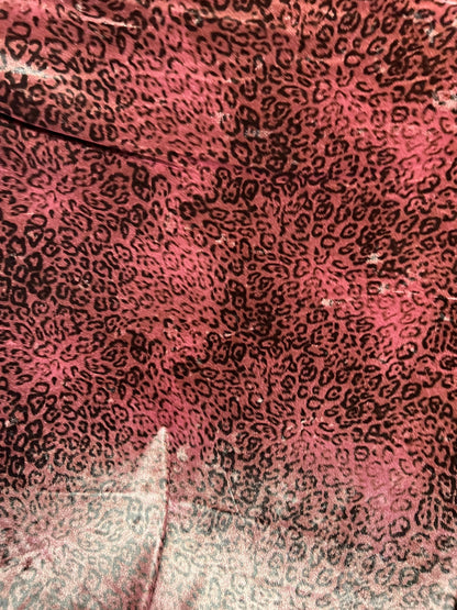 New Exotic Leopard design Mauve/Black print on great quality of stretch velvet 4-way stretch 58/60” Sold by the YD.
