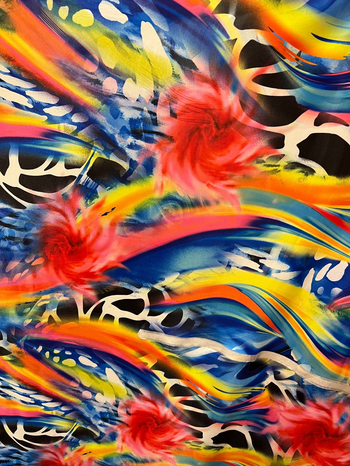 New modern abstract design multicolor print on great quality of poly spandex 4-way stretch light weight 58/60” Sold by the YD.