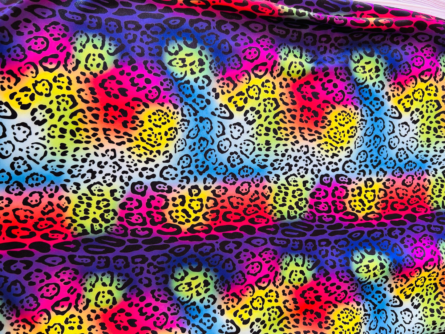 New Exotic leopard design multicolor print on nylon spandex 4-way stretch 58/60” Sold by the YD. Ships Worldwide from Los Angeles California