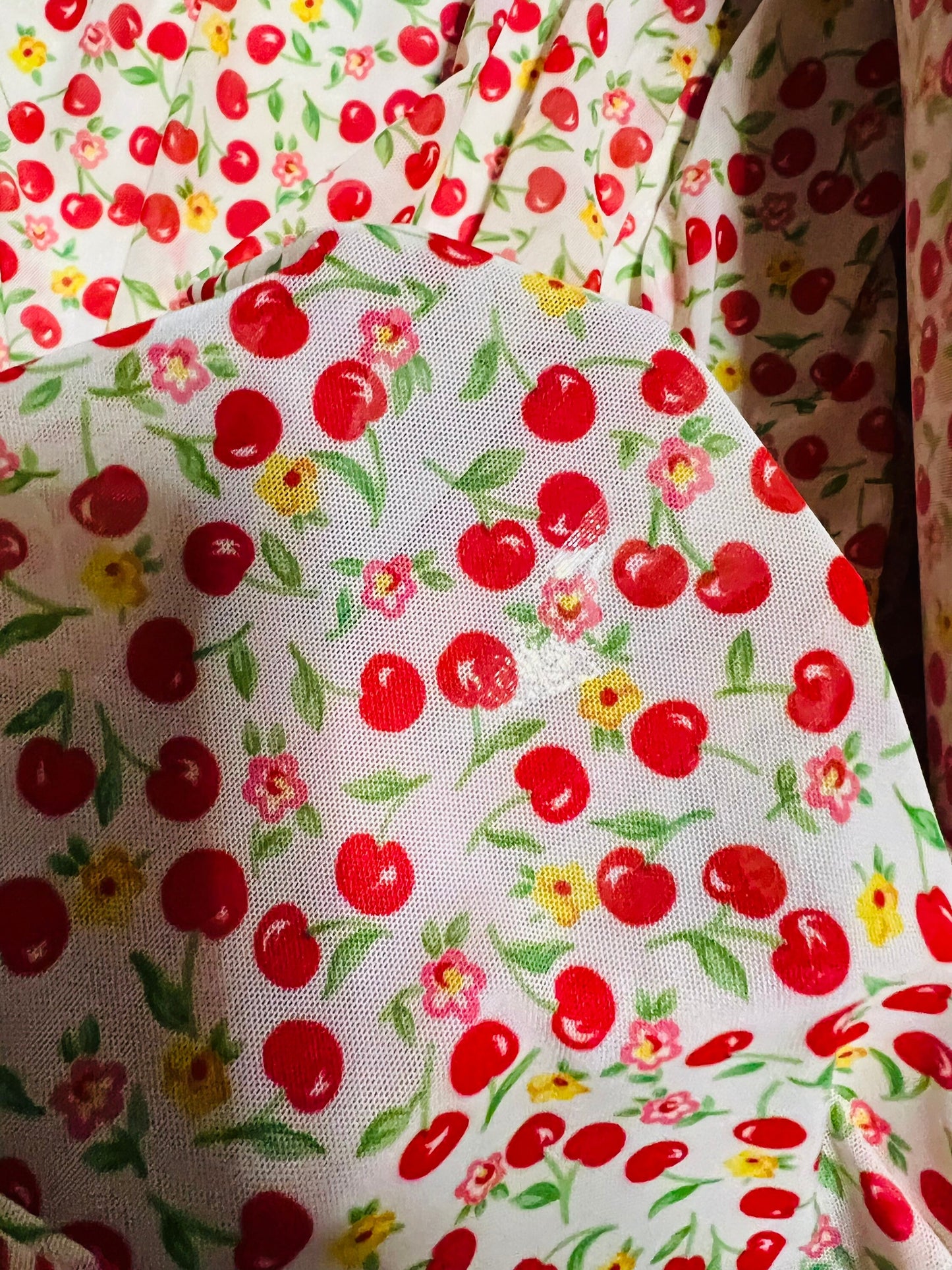 Cherry design print on best quality of power mesh nylon spandex 4-way stretch 58/60” Sold by the YD. Ships Worldwide from Los Angeles CA