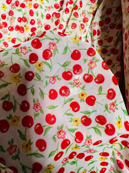 Cherry design print on best quality of power mesh nylon spandex 4-way stretch 58/60” Sold by the YD. Ships Worldwide from Los Angeles CA