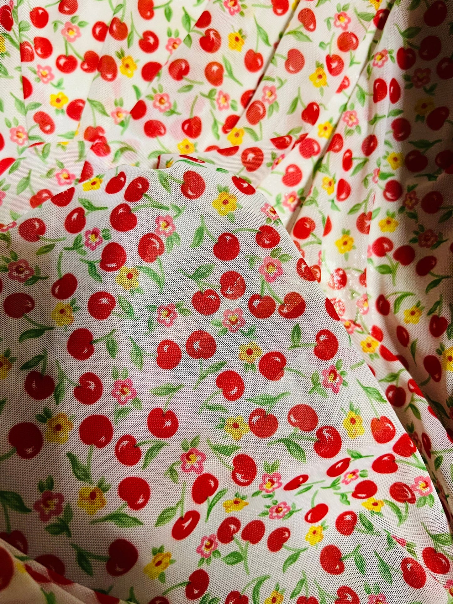 Cherry design print on best quality of power mesh nylon spandex 4-way stretch 58/60” Sold by the YD. Ships Worldwide from Los Angeles CA