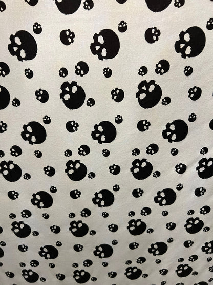 Skulls design print on ponte de Roma cotton knit fabric 2-way stretch 58/60” Sold by the YD. Ships Worldwide from Los Angeles California USA