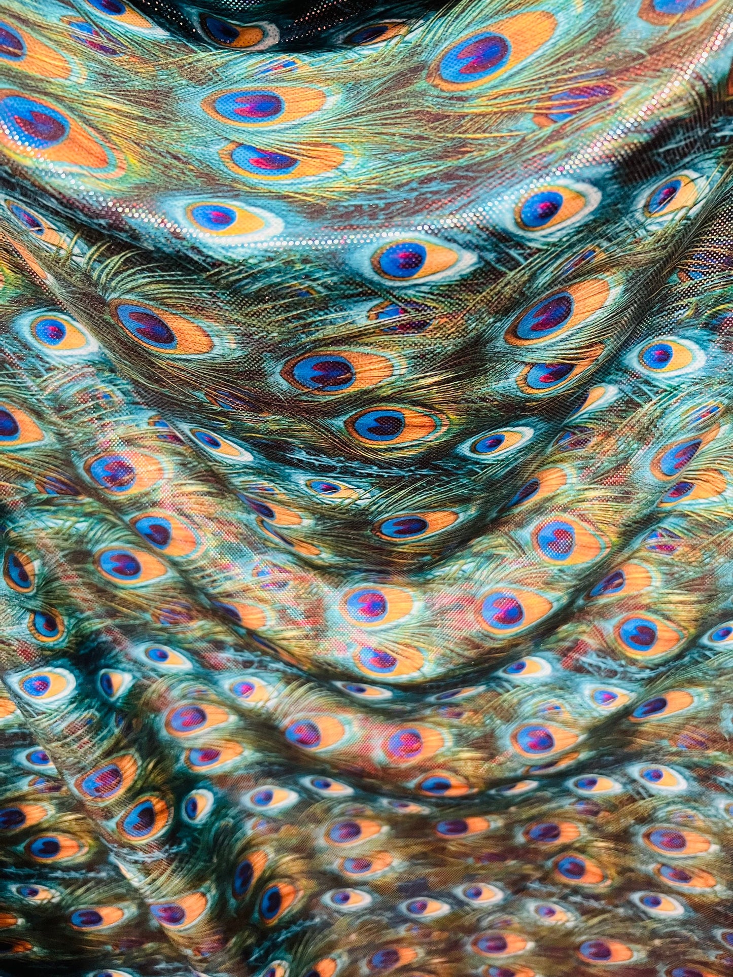 Peacock design Hologram metallic nylon spandex 4-way stretch 58/60” Sold by the YD.