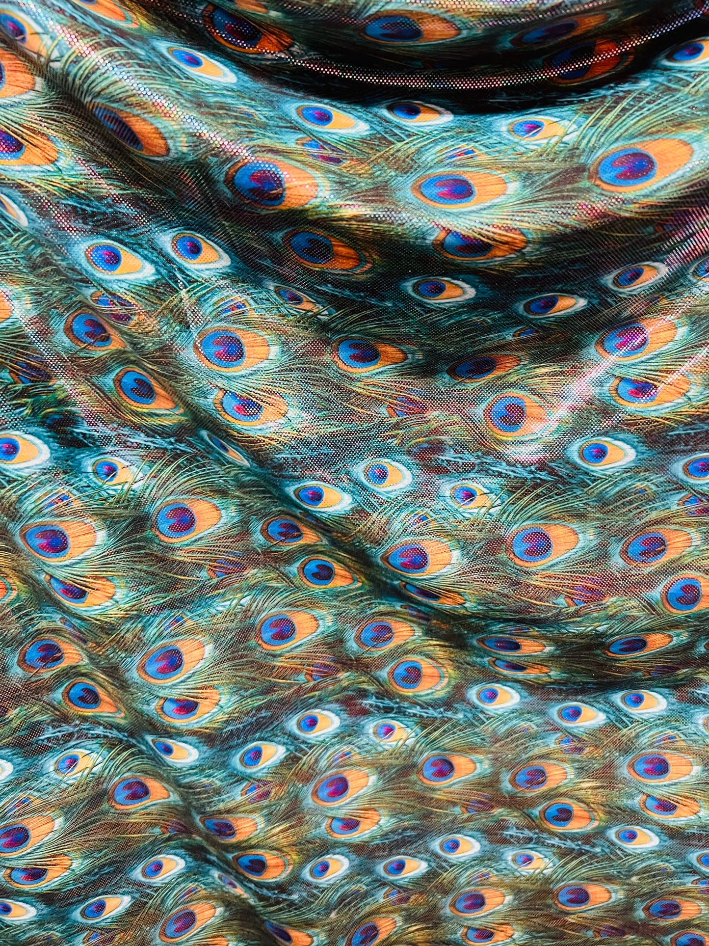 Peacock design Hologram metallic nylon spandex 4-way stretch 58/60” Sold by the YD.