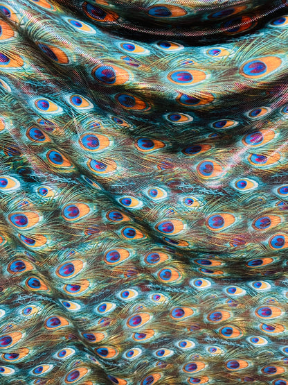 Peacock design Hologram metallic nylon spandex 4-way stretch 58/60” Sold by the YD.