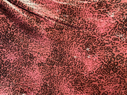 New Exotic Leopard design Mauve/Black print on great quality of stretch velvet 4-way stretch 58/60” Sold by the YD.