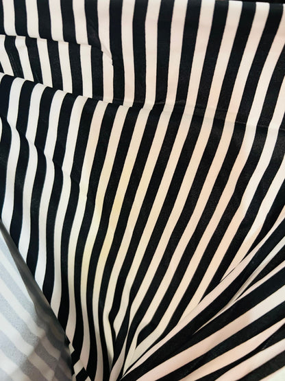 Striped design 1/2” White/Black & Red/White  print on great quality of nylon spandex 4-way stretch 58/60” Sold by the YD. Ships Worldwide