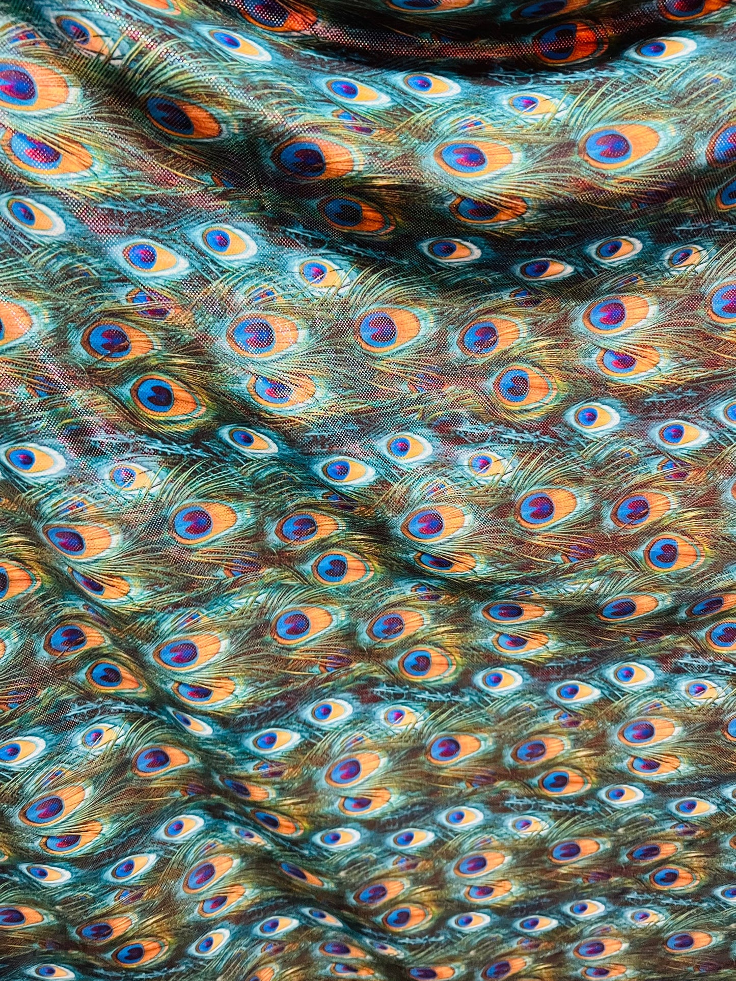 Peacock design Hologram metallic nylon spandex 4-way stretch 58/60” Sold by the YD.