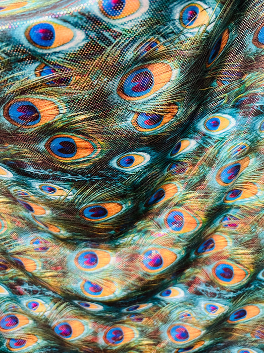 Peacock design Hologram metallic nylon spandex 4-way stretch 58/60” Sold by the YD.