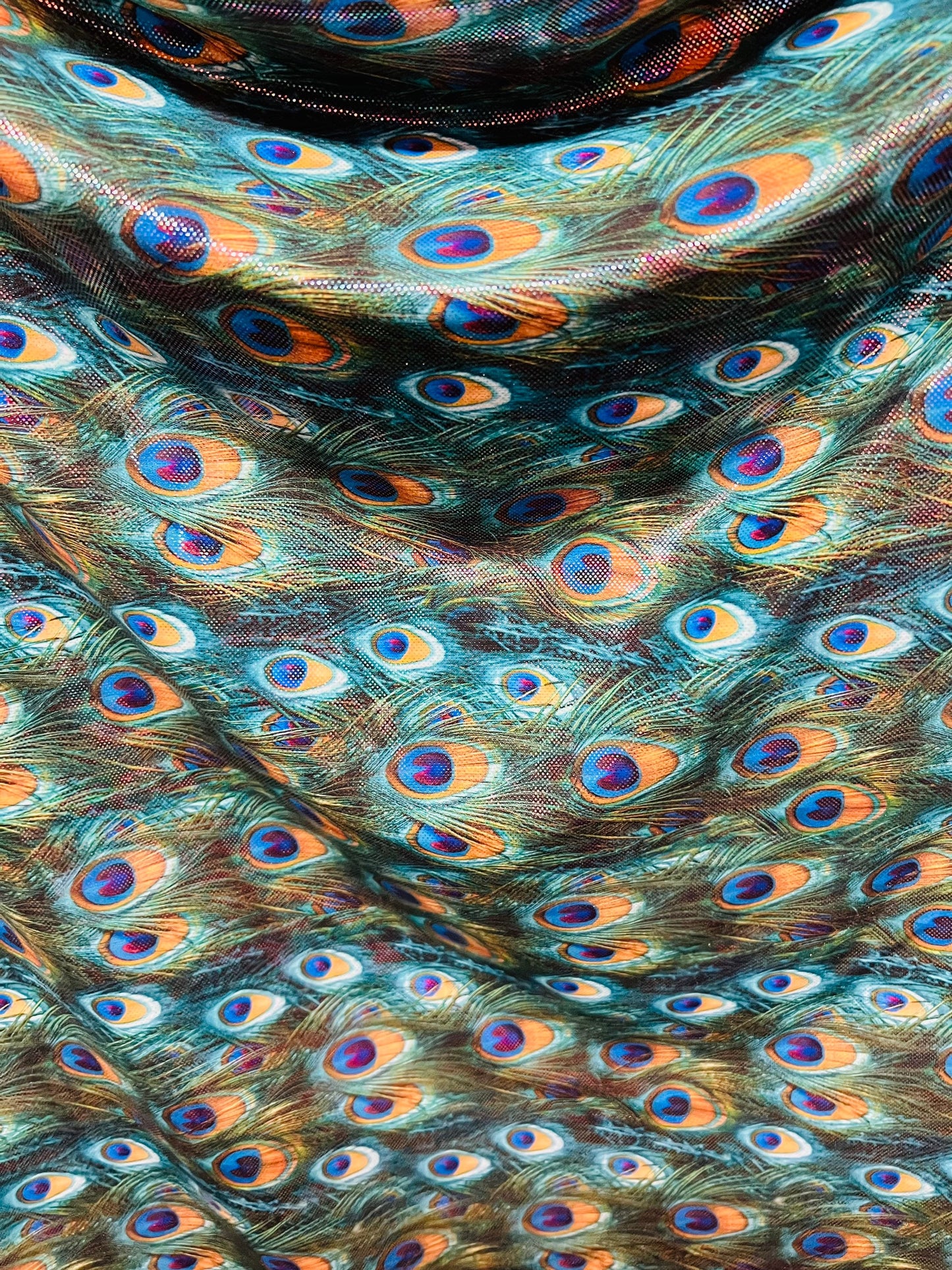 Peacock design Hologram metallic nylon spandex 4-way stretch 58/60” Sold by the YD.