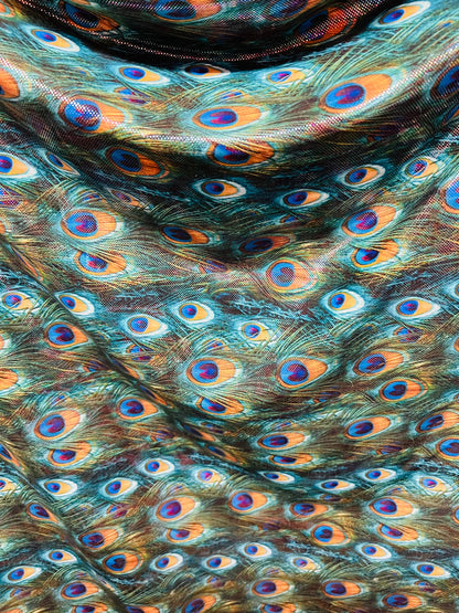 Peacock design Hologram metallic nylon spandex 4-way stretch 58/60” Sold by the YD.