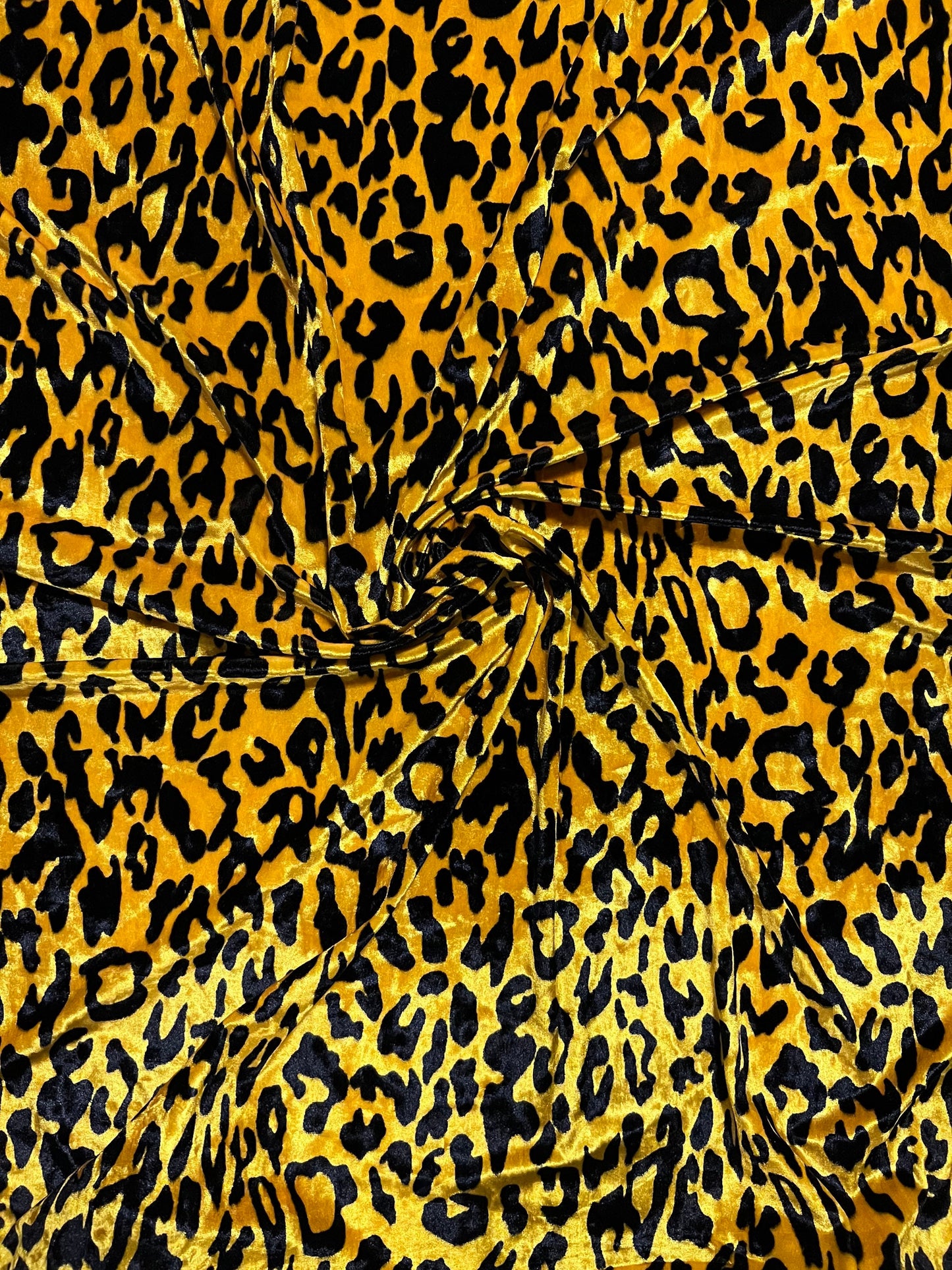 New Exotic Leopard design yellow/black print on great quality of stretch velvet 4-way stretch 58/60” Sold by the YD. Ships Worldwide