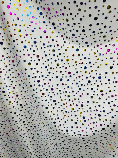 Metallic polka dots design white/multicolor hologram nylon spandex 4-way stretch 58/60” Sold by the YD. Ships Worldwide from Los Angeles CA