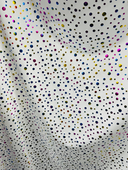 Metallic polka dots design white/multicolor hologram nylon spandex 4-way stretch 58/60” Sold by the YD. Ships Worldwide from Los Angeles CA