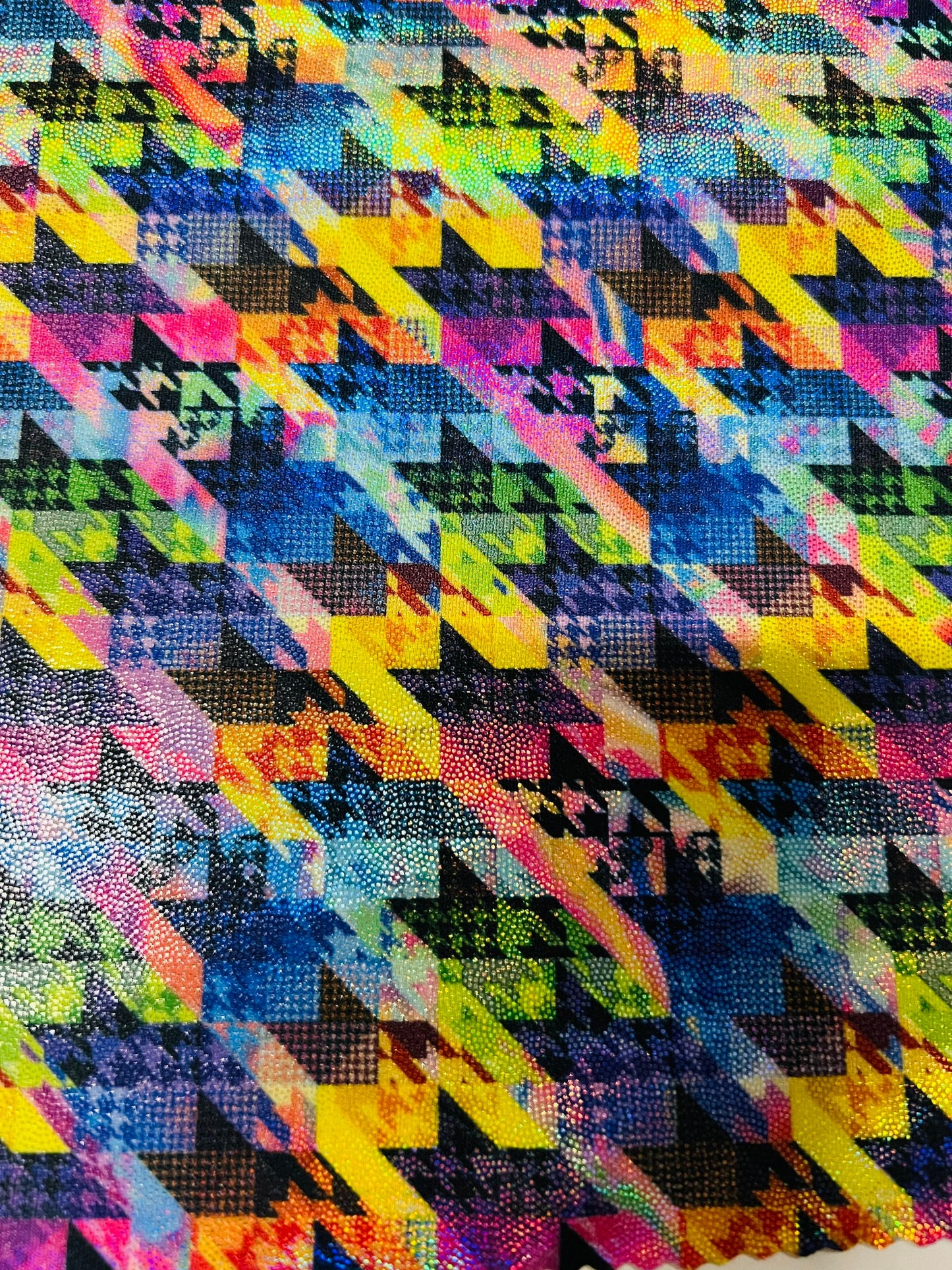 New modern houndstooth rainbow design digital foil print lacer hologram metallic nylon spandex 4-way stretch 58/60” Sold by the YD.
