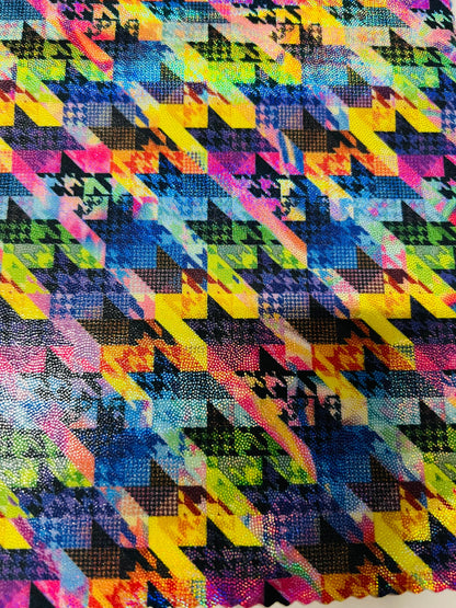 New modern houndstooth rainbow design digital foil print lacer hologram metallic nylon spandex 4-way stretch 58/60” Sold by the YD.