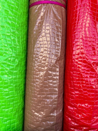New crocodile stretch vinyl  shiny latex 4-way stretch 58/60” Sold by the YD. Ships worldwide from Los Ángeles California USA