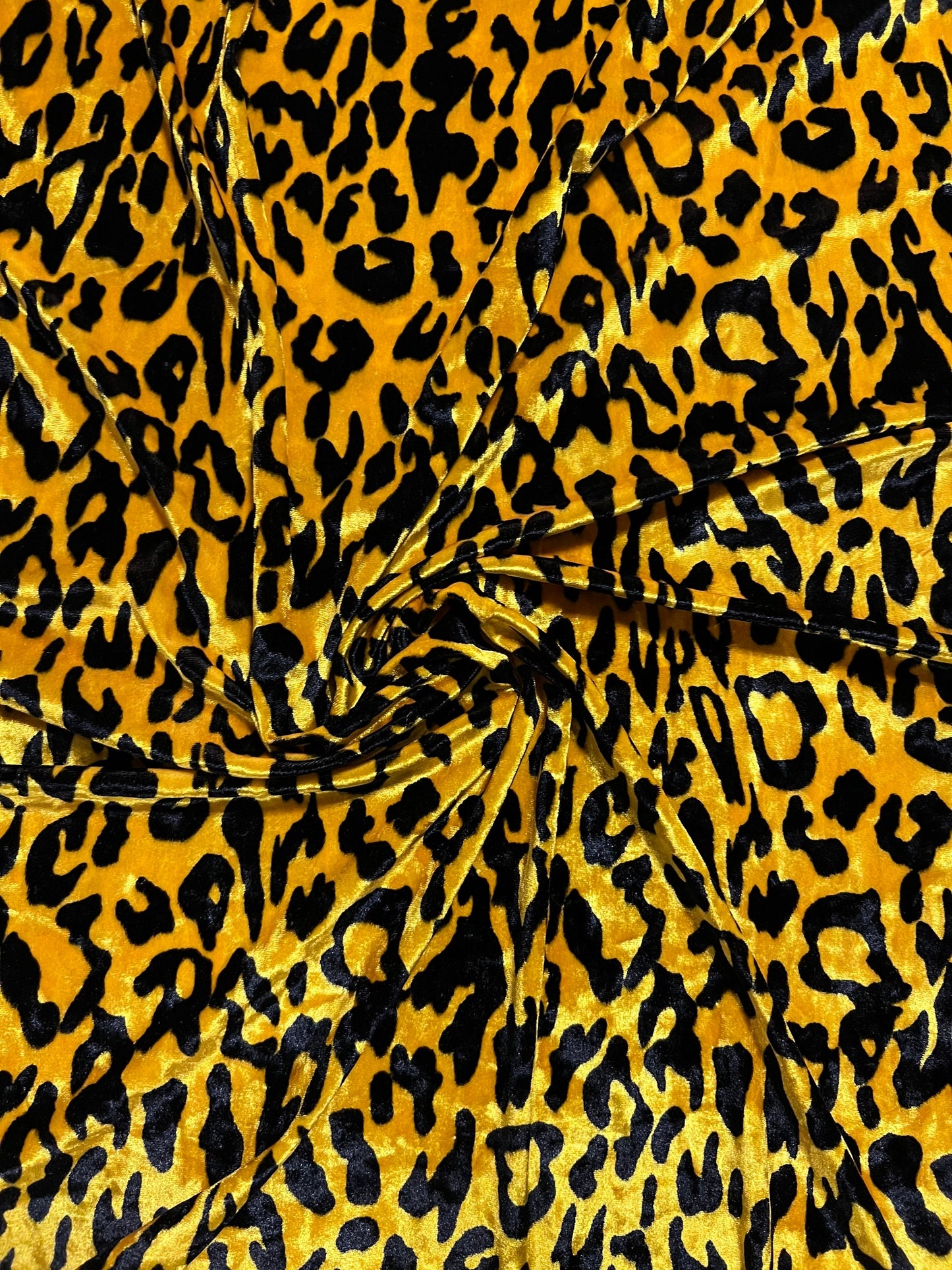 New Exotic Leopard design yellow/black print on great quality of stretch velvet 4-way stretch 58/60” Sold by the YD. Ships Worldwide