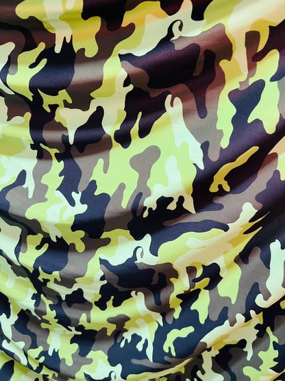 Camouflage design neon green/multi print on great quality of nylon spandex medium weight 4-way stretch 58/60” Sold by the YD.
