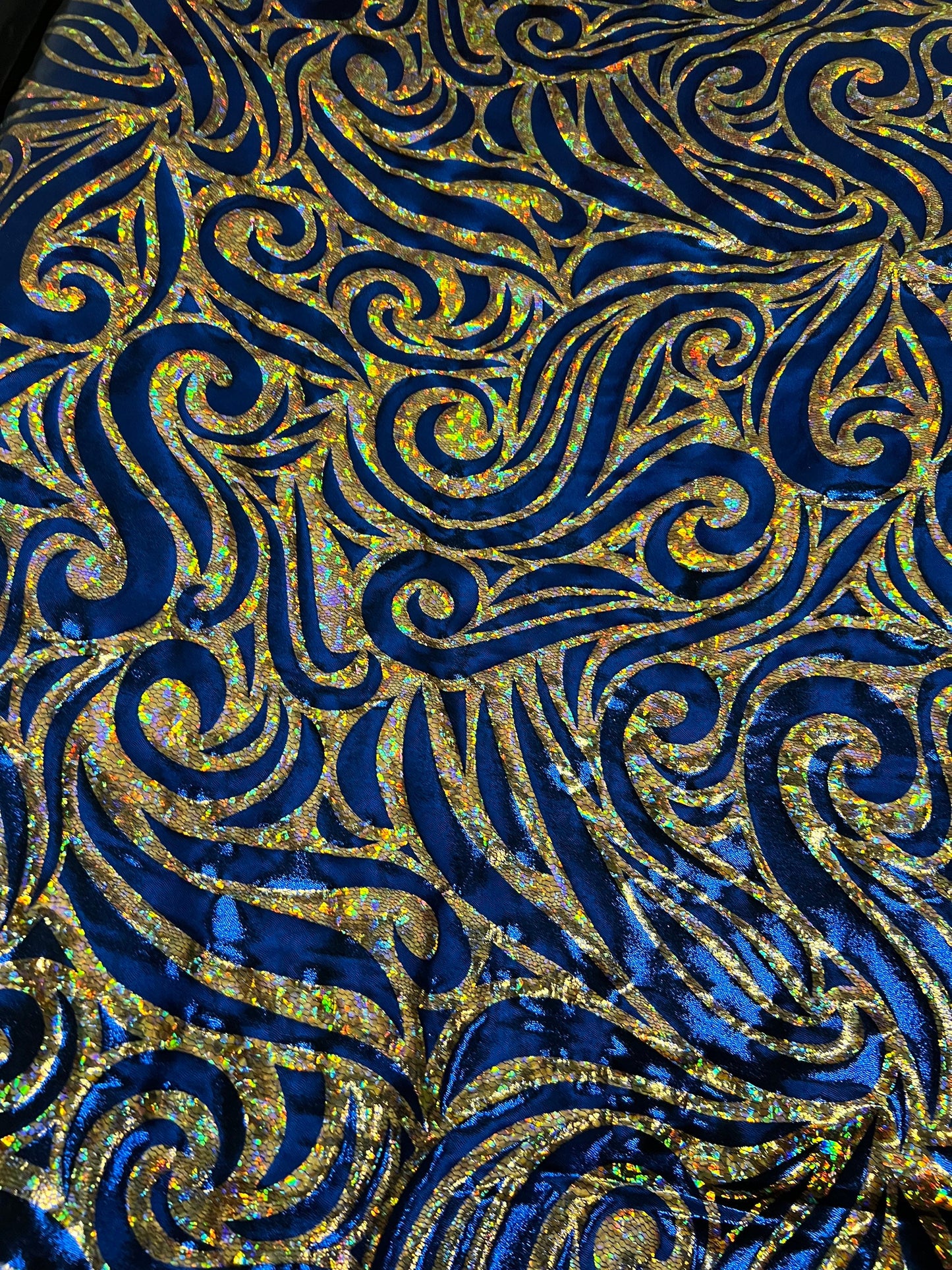 Rolex Luxury swirl design hologram metallic nylon spandex 4-way stretch Midnight Blue/Gold 58/60” Sold by the YD. Ships Worldwide from L.A