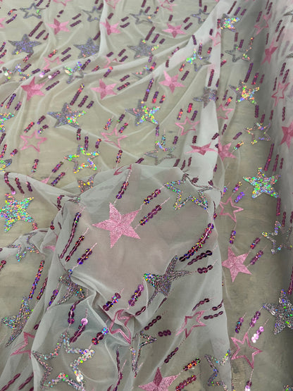 New Freedom stars design hologram sequins embroidered on power mesh 4-way stretch 58/60” Sold by the YD. Ships Worldwide from Los Ángeles Ca