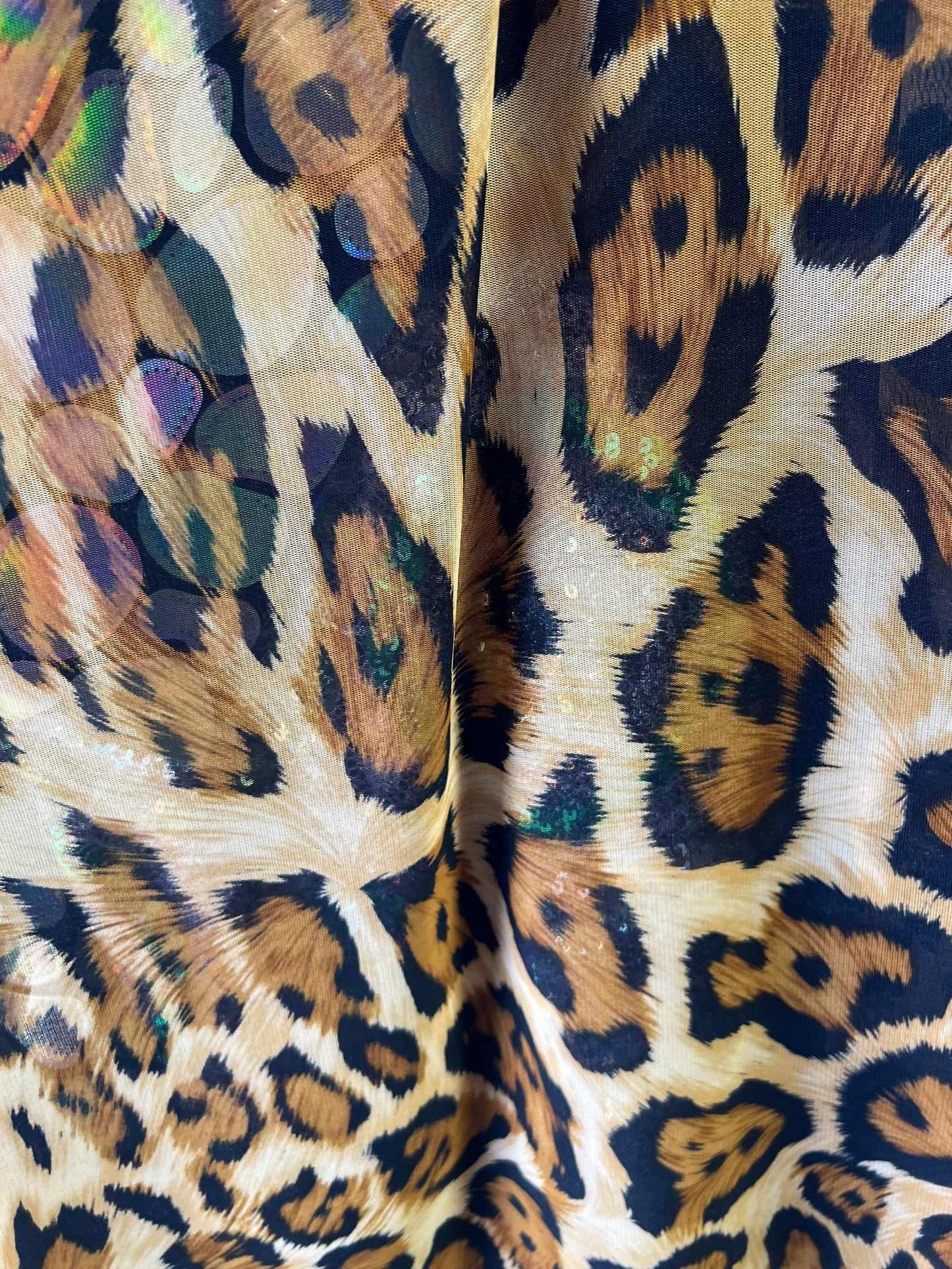 Jaguar design print on great quality of power mesh 4-way stretch 58/60” Sold by the YD. Ships Worldwide from Los Angeles California USA.