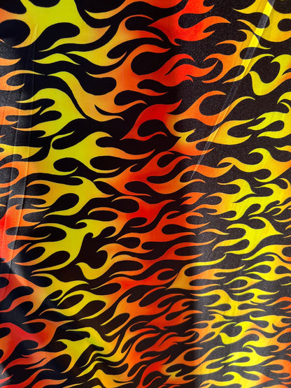 New Flame design Black/Fire color print on light weight poly spandex 2-way stretch 58/60” Sold by the Yd.