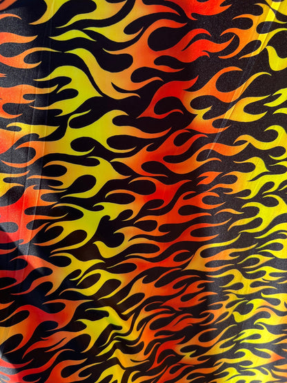 New Flame design Black/Fire color print on light weight poly spandex 2-way stretch 58/60” Sold by the Yd.