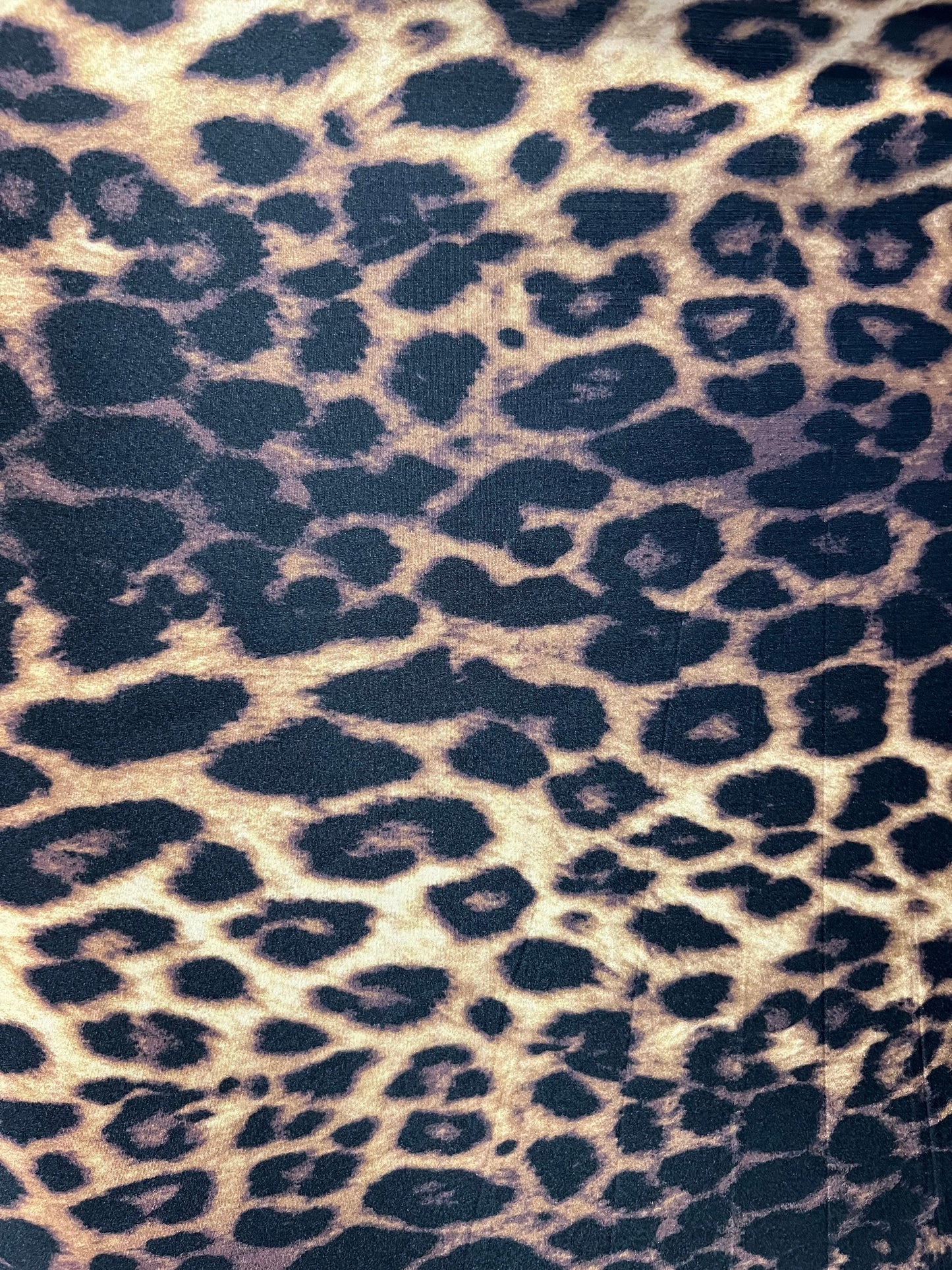 Exotic Brown Leopard design print on great Quality of Nylon spandex 4-way stretch 58/60” Sold by the YD. Ships Worldwide from Los Ángeles CA
